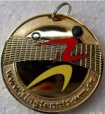 Geocoin_Ringtennis_Vorne.jpg